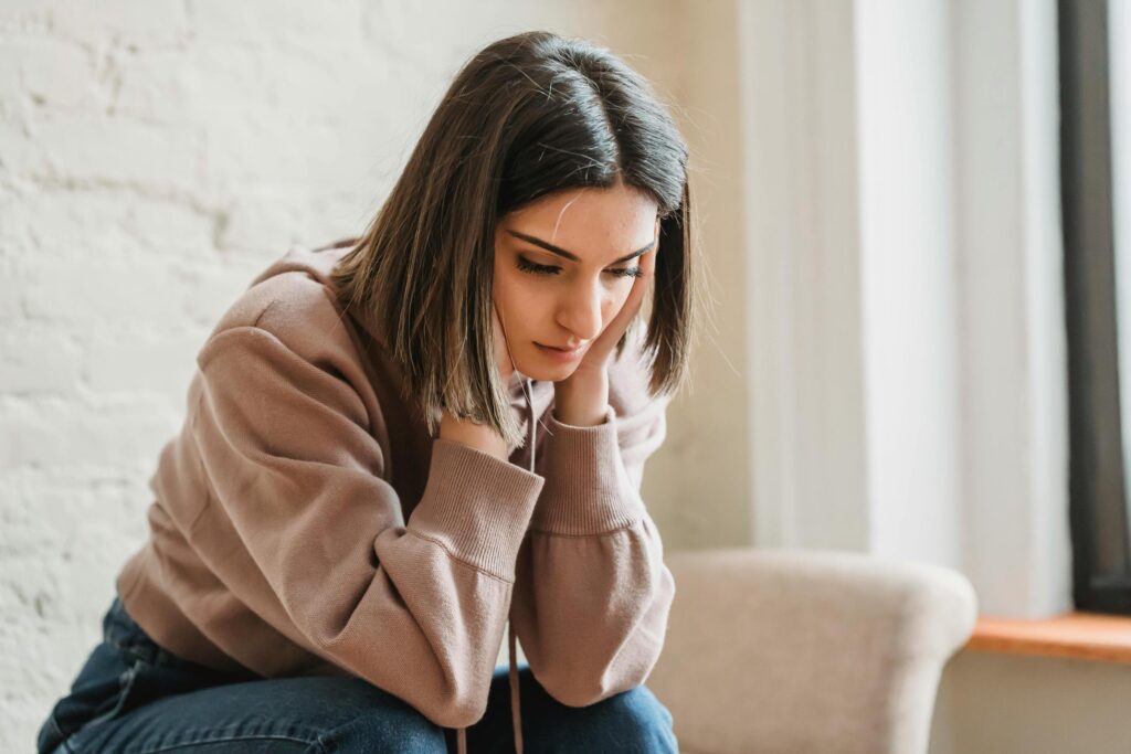 woman worried about signs her husband has a gambling problem