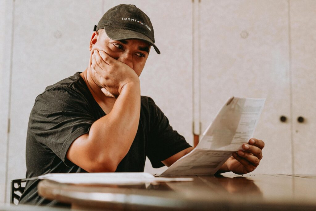 man stressed about gambling debt wondering does gambling addiction get worse