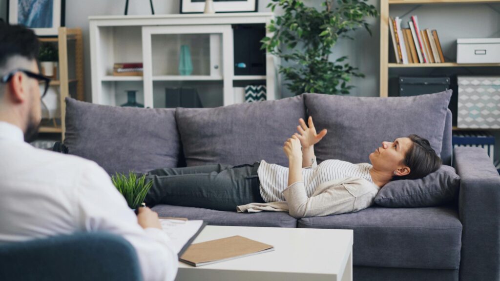 therapist and patient discussing CBT for gambling addiction