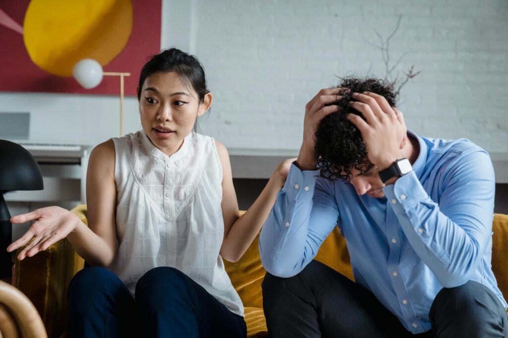 couple having serious conversation about spouse gambling addiction